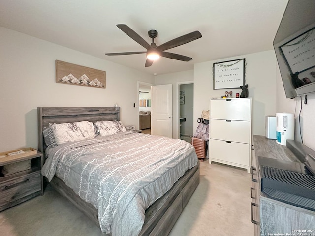 bedroom featuring ceiling fan and light colored carpet