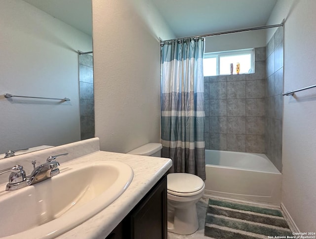 full bathroom with vanity, shower / bath combination with curtain, and toilet