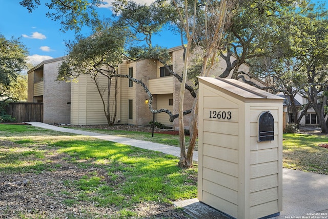 exterior space with a front yard