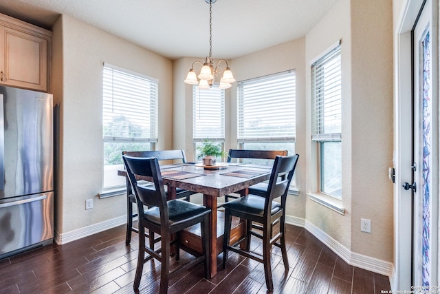 dining room with a notable chandelier