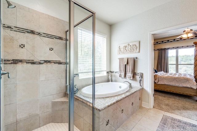 bathroom featuring ceiling fan, plenty of natural light, independent shower and bath, and tile patterned flooring