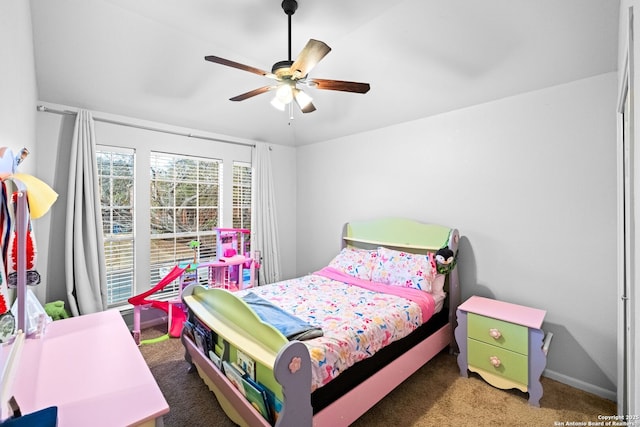 carpeted bedroom featuring ceiling fan