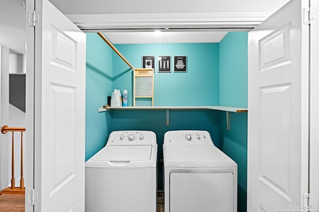 laundry room with independent washer and dryer