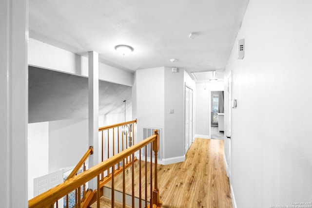 hall featuring light hardwood / wood-style flooring