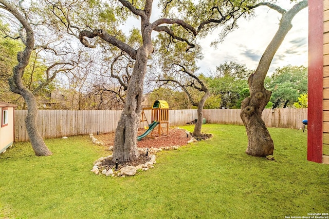 view of yard with a playground