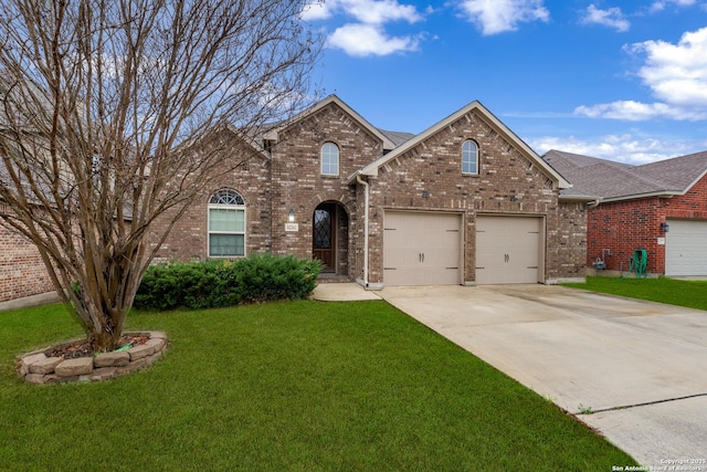 front of property with a garage and a front yard