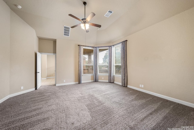 interior space featuring ceiling fan, light colored carpet, and high vaulted ceiling