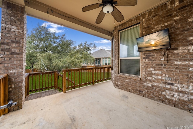 view of patio featuring ceiling fan