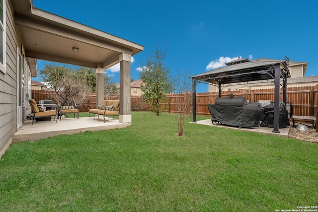 view of yard with an outdoor hangout area, a gazebo, and a patio area