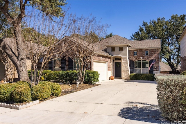 view of front of property with a garage