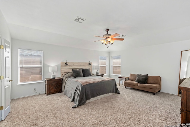 carpeted bedroom featuring ceiling fan