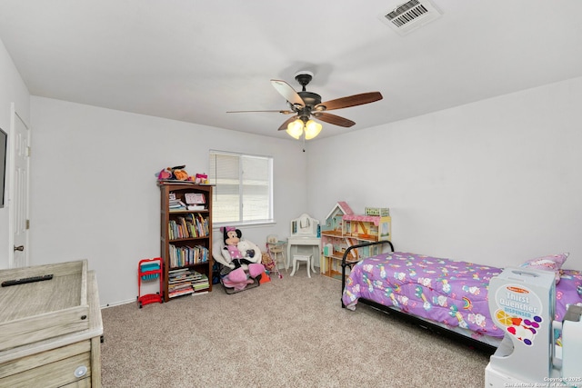 bedroom featuring ceiling fan and light colored carpet