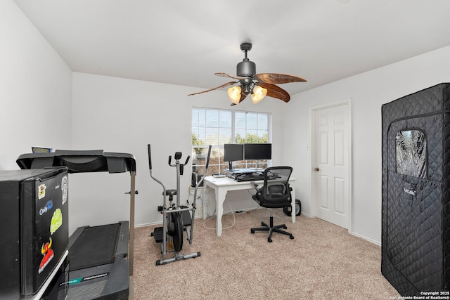 carpeted office with ceiling fan