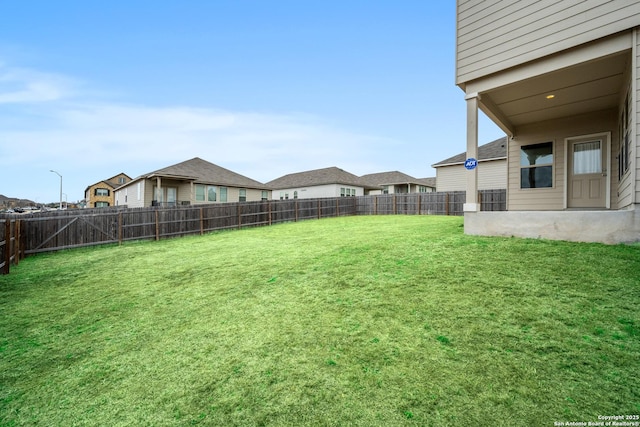 view of yard featuring a fenced backyard