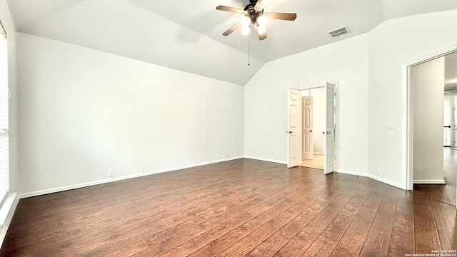 unfurnished room featuring ceiling fan, lofted ceiling, and dark hardwood / wood-style flooring