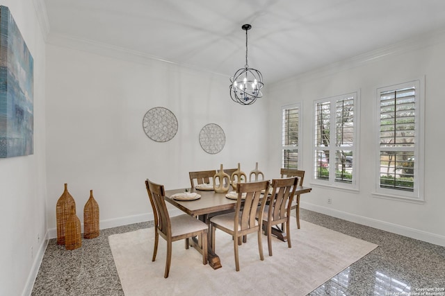 dining space with ornamental molding and a notable chandelier