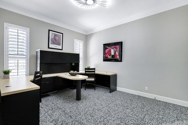 office with dark carpet, a wealth of natural light, and ornamental molding