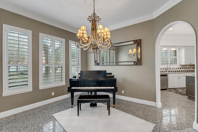 miscellaneous room featuring sink, crown molding, and a chandelier