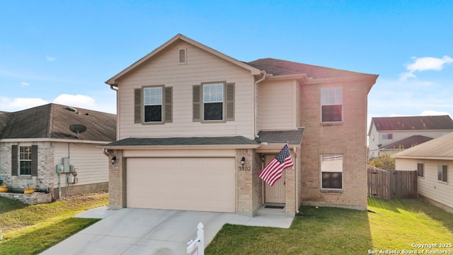 front of property featuring a garage and a front lawn