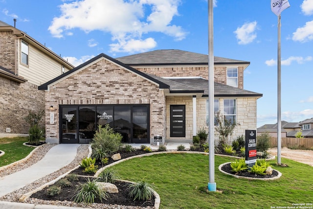 view of front of home with a front lawn