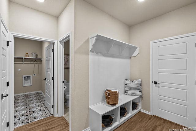 mudroom with hardwood / wood-style floors