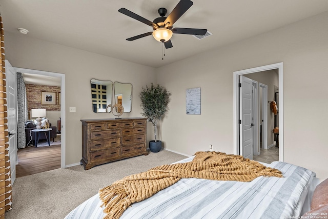 carpeted bedroom featuring ceiling fan