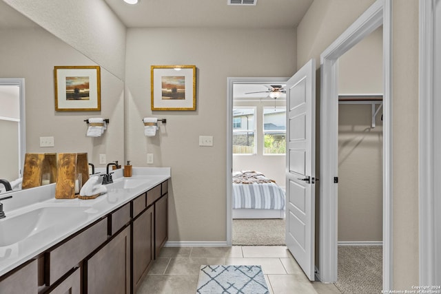 bathroom with vanity, tile patterned floors, and ceiling fan