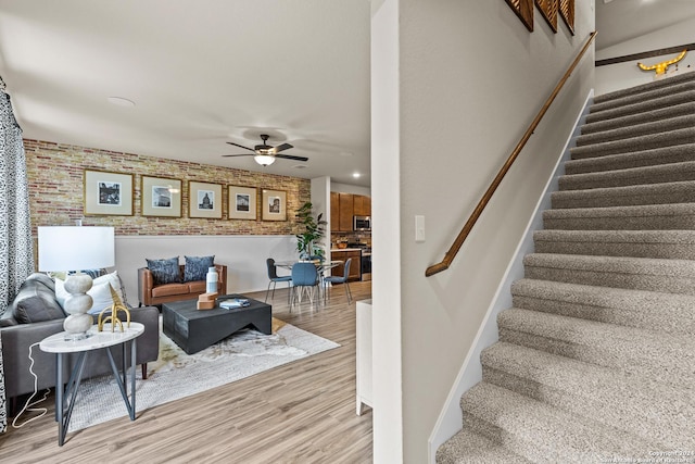 interior space with hardwood / wood-style flooring and ceiling fan