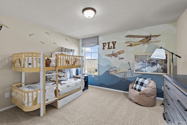 carpeted bedroom with a textured ceiling