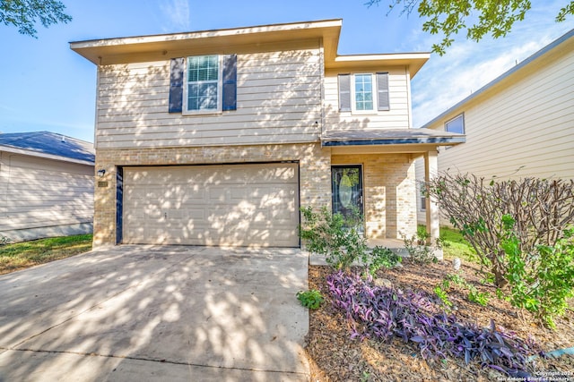 front of property featuring a garage