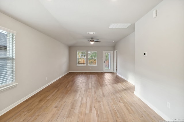 spare room with ceiling fan and light hardwood / wood-style flooring