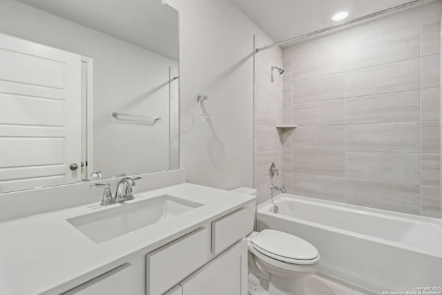 bathroom with toilet, bathtub / shower combination, vanity, and recessed lighting