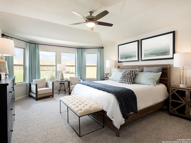 bedroom featuring ceiling fan and light colored carpet