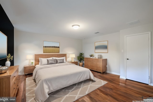 bedroom featuring hardwood / wood-style flooring