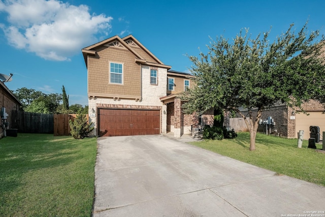 view of front facade featuring a garage and a front yard