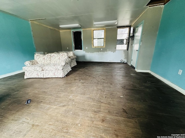 unfurnished living room with hardwood / wood-style flooring