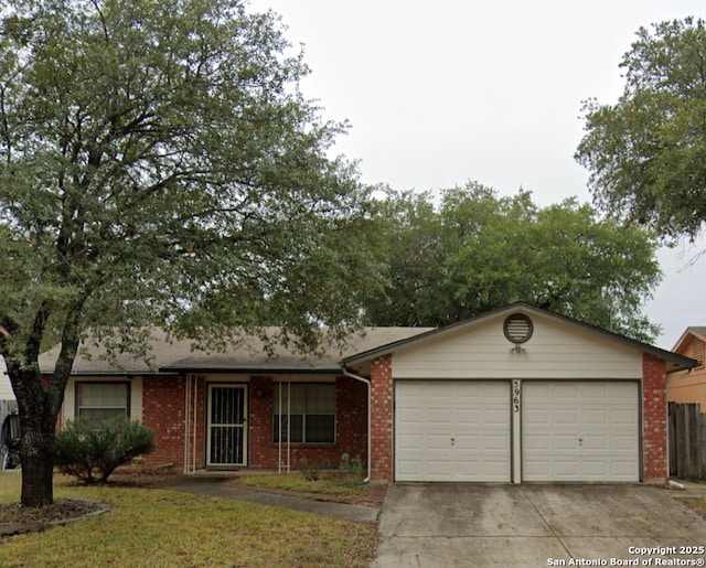 ranch-style home featuring a garage