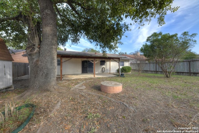 back of house featuring a patio area