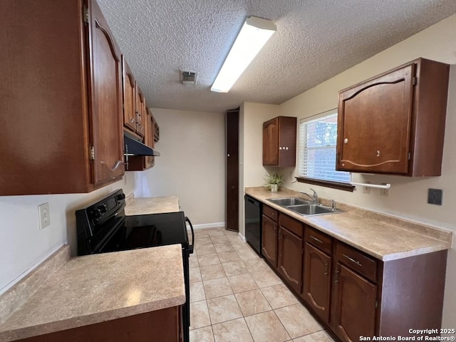 kitchen featuring light tile patterned floors, sink, a textured ceiling, black appliances, and dark brown cabinetry