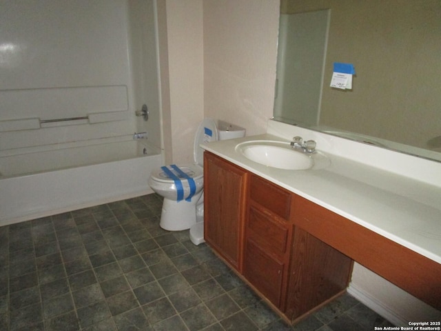 full bathroom featuring vanity, toilet, and washtub / shower combination