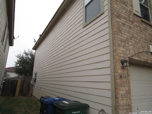 view of home's exterior with a garage