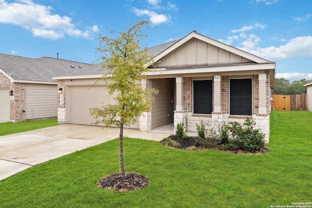 view of front of house with a garage and a front yard