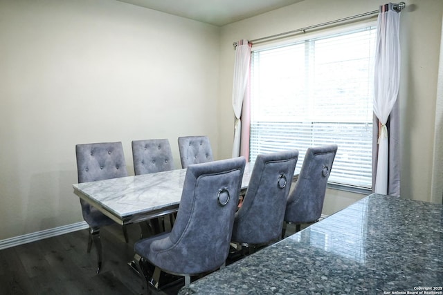 dining room featuring dark hardwood / wood-style floors