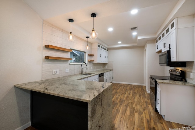 kitchen featuring glass insert cabinets, white cabinetry, a peninsula, and open shelves