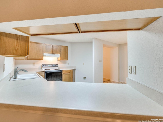 kitchen with sink and electric stove