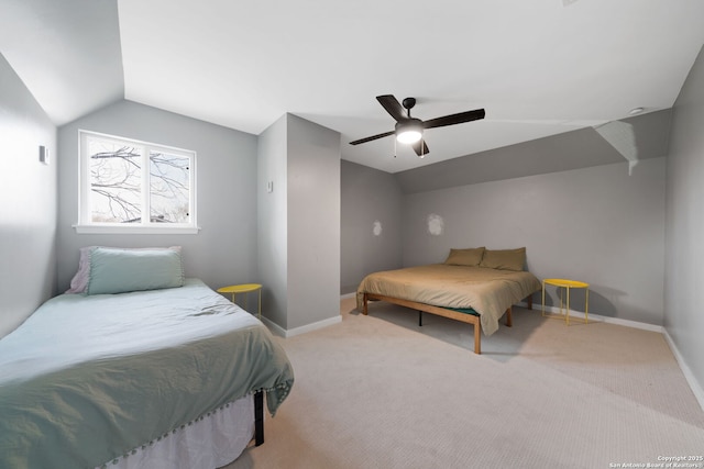 bedroom with lofted ceiling, carpet, and ceiling fan