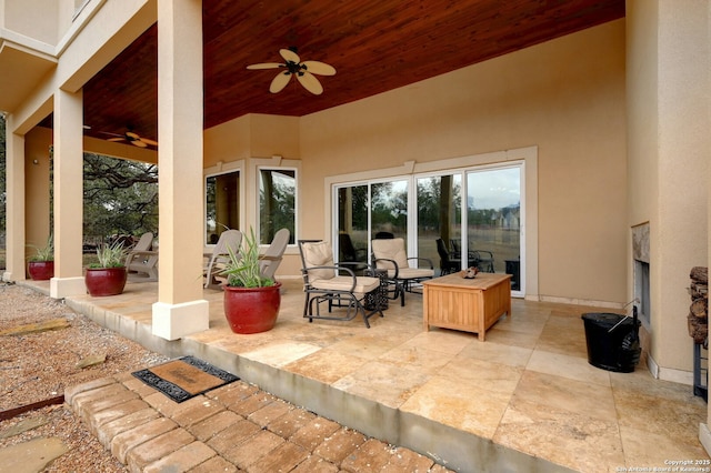 view of patio featuring ceiling fan