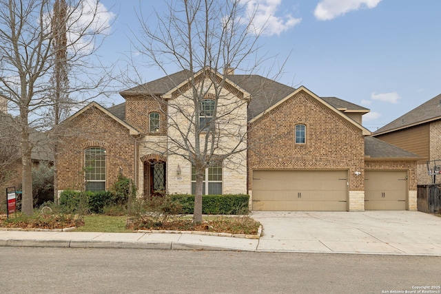 front of property with a garage