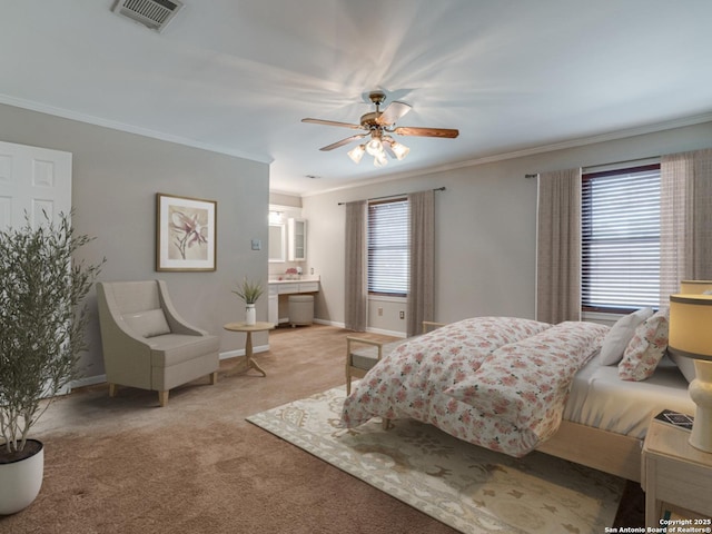 carpeted bedroom featuring crown molding and ceiling fan