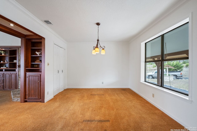 unfurnished room with light carpet, crown molding, visible vents, and a notable chandelier